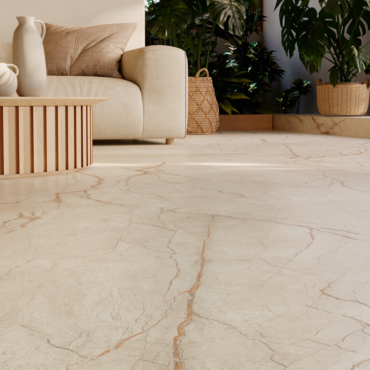 Close-up of Grespania Canela Roma marble effect floor tiles in a living room, showing the reddish-brown veining