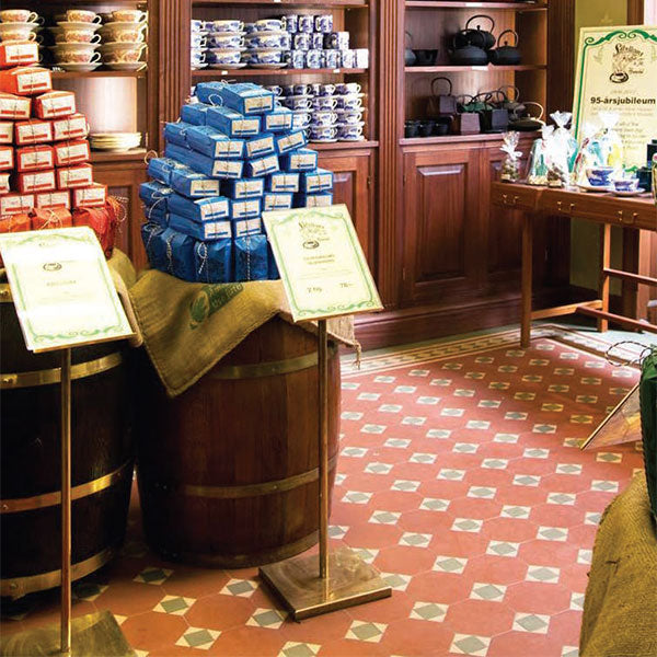 Arundel pattern with Bronte border in Red, Green and Buff