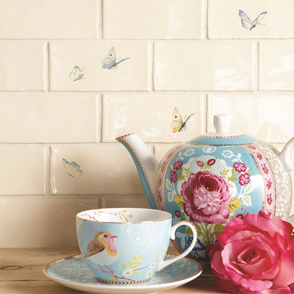 Tiles from the Residence Butterflies collection, shown on a palomino base.