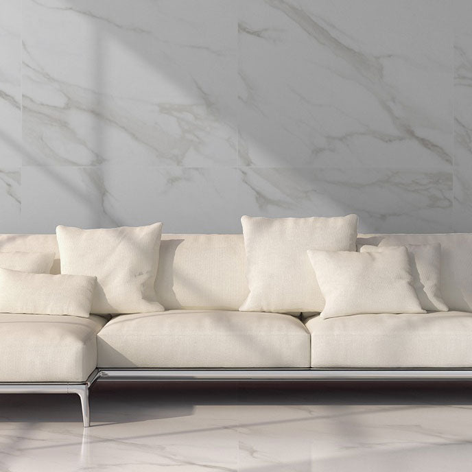 Statuario Mercury White tiles on living area wall