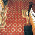 Arundel pattern with Bronte border in Red, Green and Buff