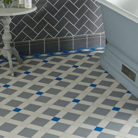 Norwich pattern in Grey, Dover White and Pugin Blue with a Bennett border